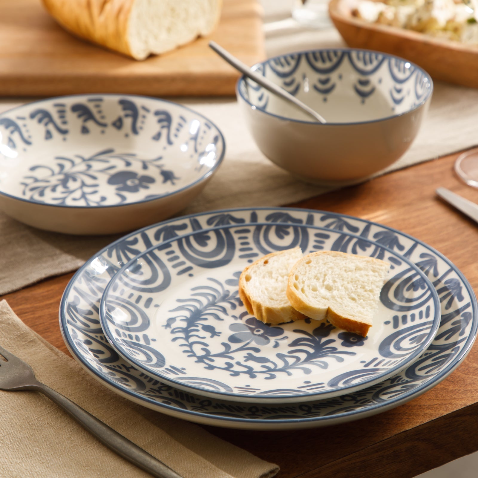 Bloomhouse - 2-Time Oprah’s Favorite Things - Valencia Flor 16 Piece Dinnerware Set, Artisanal Decorated Stoneware Plates & Bowls, Service for 4, Microwave & Dishwasher Safe, Iris Blue